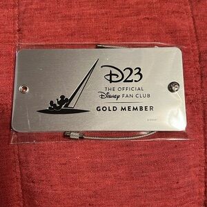 D23 Gold Member Around the World of Disney Parks luggage tag new in packaging